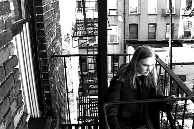 women on fire escape 